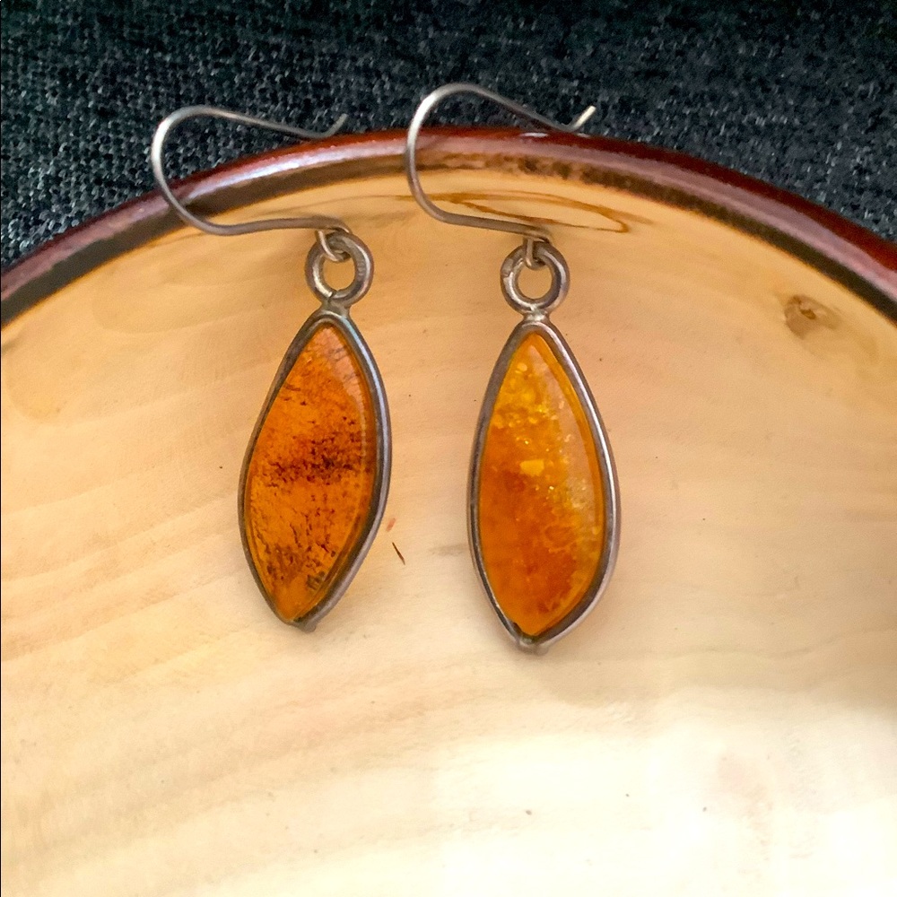 Two pairs of sterlin silver and amber earrings